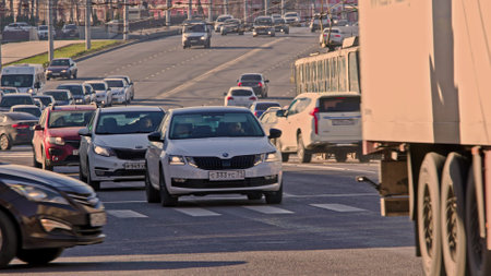 pedestrians crossing street in front of car traffic in central streets of Tula, Russiaのeditorial素材
