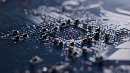 Computer electronic circuit board with radial conductor tracks and SMD capacitors rotating macroの写真素材