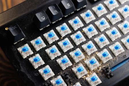 dirty mechanical keyboard without keycaps before cleaning