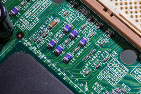 old digital circuit board with microprocessors and components, closeup full-frame macro backgroundの写真素材
