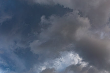overcast sky, full-frame gray clouds background and textureの写真素材
