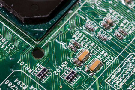 wet digital circuit board with microprocessors and components, closeup full-frame macro background.の写真素材