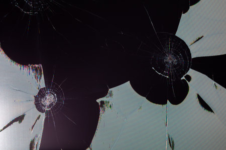 damaged LCD screen with cracks, full-frame background and texture.の写真素材