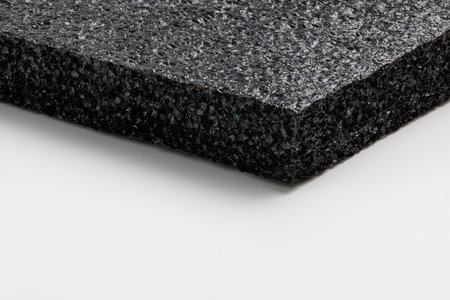 Black high-impact closed-cell polyethylene black foam sheet on white background. Specifically designed packing material.の写真素材