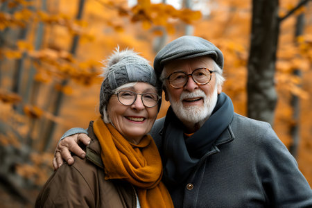 senior heterosexual Caucasian couple in beautiful autumnal natureの素材