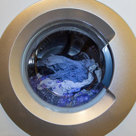 a close view of domestic washing machine at workの写真素材