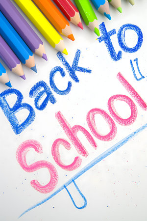 Naive childrens drawing with colored chalk on white paper, made by hand by a child, text Back to Schoolの素材