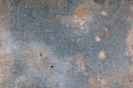 old dirty zinc coated sheet metal with cement stains