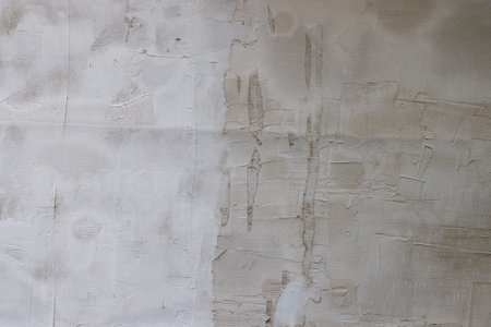 rough draft plaster stucco over reinforcement plastic mesh, full-frame background and textureの写真素材