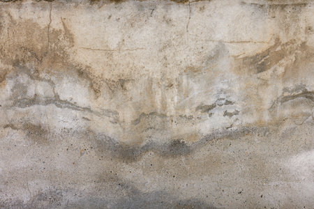 Old water damaged plaster wall surface - full-frame background and textureの写真素材