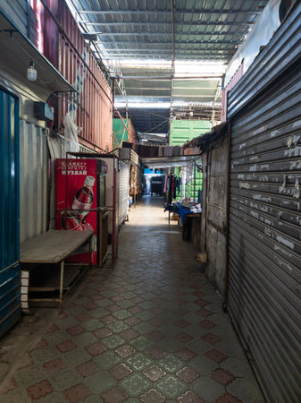 narrow passage between trading containers in Dordoi Bazaar in Bishkek, Kyrgyzstanのeditorial素材