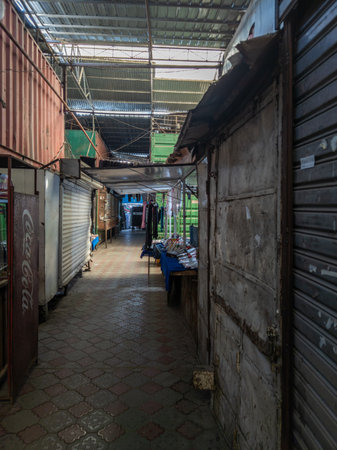 narrow passage between trading containers in Dordoi Bazaar in Bishkek, Kyrgyzstanのeditorial素材