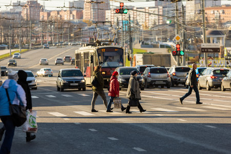 A bustling city intersection with pedestrians and vehicles in Tula, Russiaのeditorial素材