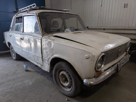 old soviet car in a garageのeditorial素材
