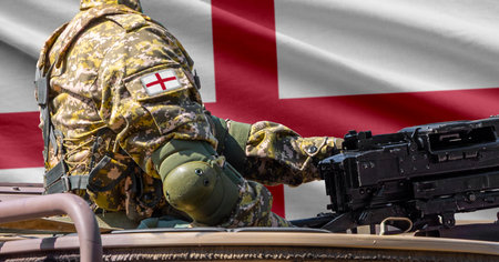 Saint George flag with soldier at machine gun turret in front of it. Closeup side view.の写真素材