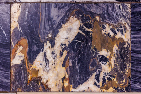 Worn Purple Blue and Gold Marble Floor Tileの写真素材