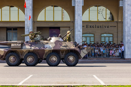 Bishkek, Kyrgyzstan - May 8, 2025 -Soldiers with MANPADS SA-18 Grouse on APC BTR-80 during victory paradeのeditorial素材