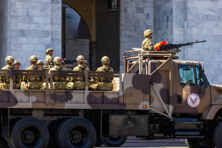 Bishkek, Kyrgyzstan - May 8, 2025 - regular army soldiers in camouflage uniforms with military trucks outdoors during victory paradeのeditorial素材