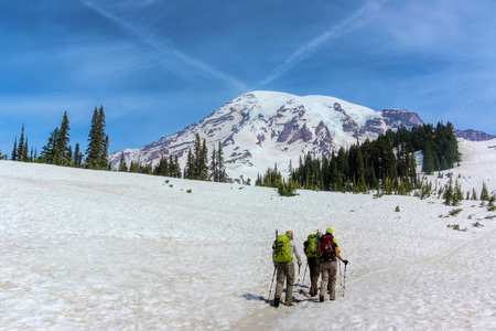 Three hikers on Mt. Rainier on a clear day. 15 June, 2013のeditorial素材
