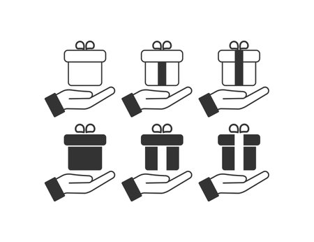 Gift and open hand icon. Give present illustration symbol. Sign make an offer vector.のイラスト素材