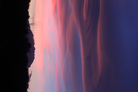 Spectacular sunset in Varese, caused by the smog and the fumes of the firesの写真素材