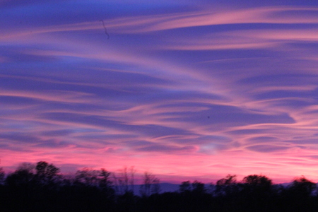 Spectacular sunset in Varese, caused by the smog and the fumes of the firesの写真素材