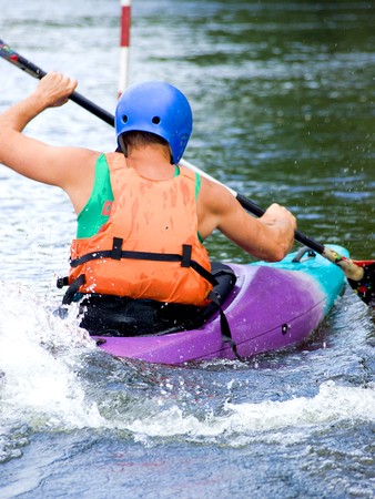 image of the kayaker with an oar on the water