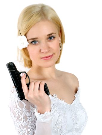 beauty young bride in white dress holding the gunの写真素材