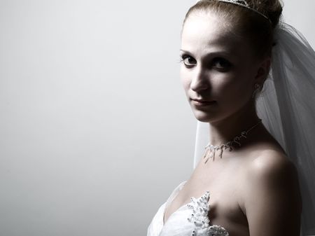 Beautiful bride portrait in the white backgroundの写真素材