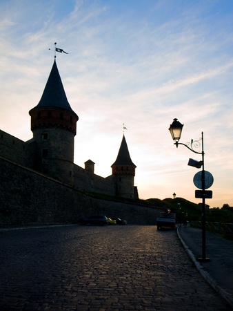 Towers of old castle in silhouette (Kamenets-Podolskiy, Ukraine)のeditorial素材