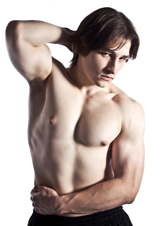 Sexy muscular male athlete isolated on white backgroundの写真素材