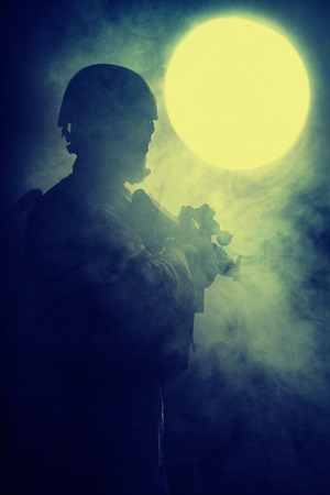Bearded special forces soldier on dark backgroundの写真素材