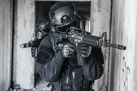 Spec ops police officers SWAT in actionの写真素材