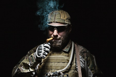 Green Berets US Army Special Forces Group soldier smokingの写真素材