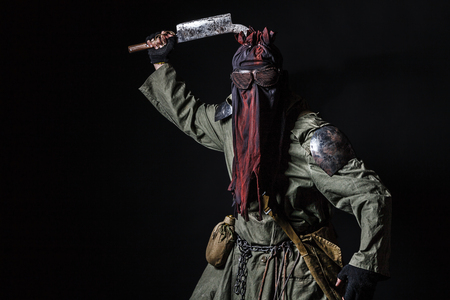 Nuclear post apocalypse. Studio shot of survivor in tatters