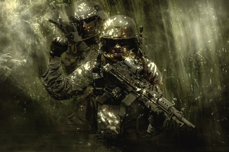 Green Berets US Army Special Forces Group soldiers in the jungleの写真素材