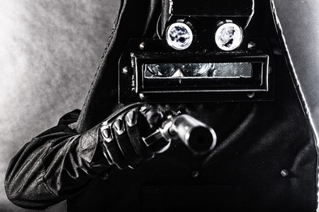 SWAT fighter with pistol and ballistic shieldの写真素材