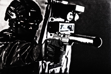Police special team fighter with pistol and shieldの写真素材