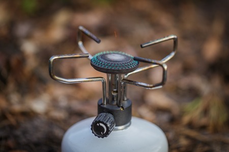 cooking on a gas burner in the woodsの写真素材