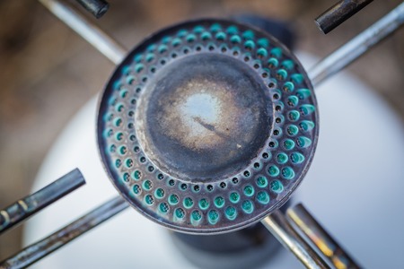 cooking on a gas burner in the woodsの写真素材