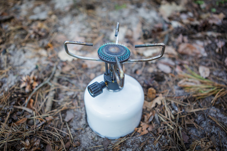 cooking on a gas burner in the woodsの写真素材