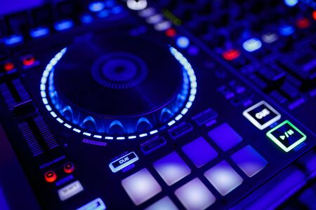 closeup view of a DJs mixing deskの写真素材