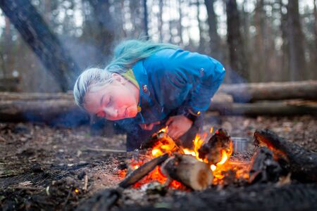 Campfire with sparks in forest