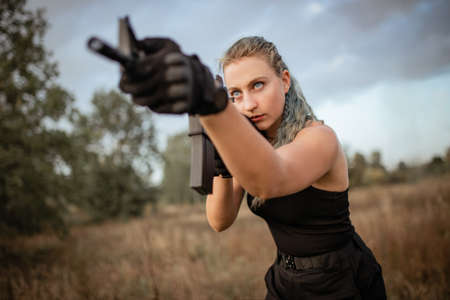 Sexy woman with rifle