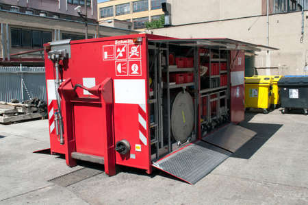 Brno, Czech Republic - May 26, 2012: A red fire rescue container full of necessary equipment.