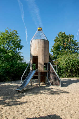 Brno, Czech Republic - 04 October 2021: A playground with a large wooden racket that children can crawl on. The playground is in the park next to the Brno Observatory and Planetariumのeditorial素材