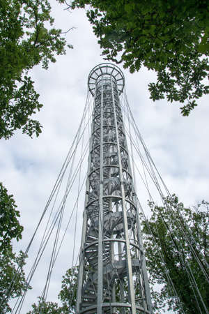 Steel gray construction of a high lookout tower in Brno, Czech Republic, bottom view into the...