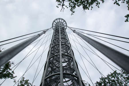 Steel gray construction of a high lookout tower in Brno, Czech Republic, bottom view into the...