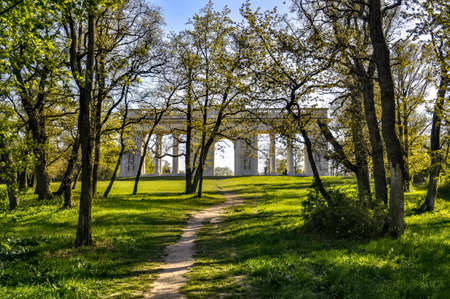 Memorial building of the colonnade at Reistna in the summer on the green grass. Historic monument...