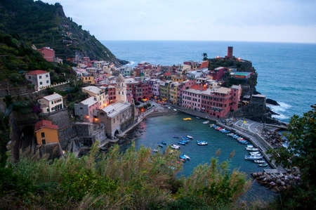 Harbor with sea and coast with colorful houses in Vernazza, Italy (Cinque Terre area)